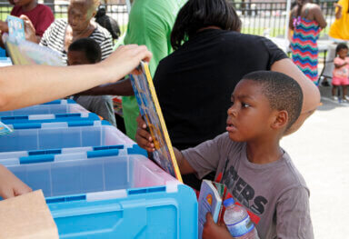 Literacy Event Brings Libraries into the Homes of Sudekum Apartments